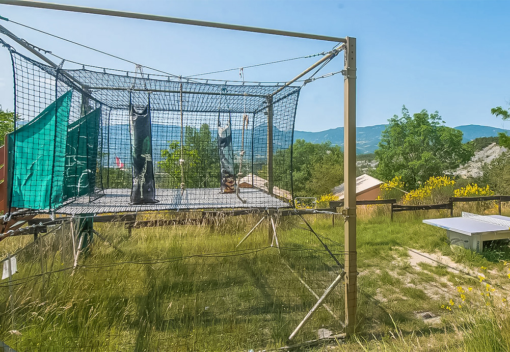 play area with a trampoline for little ones
